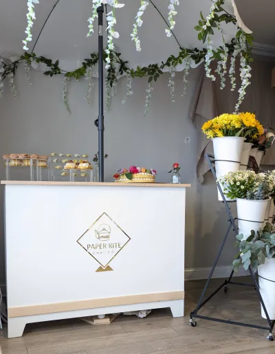Paper Kite chai cart dressed with hanging flowers